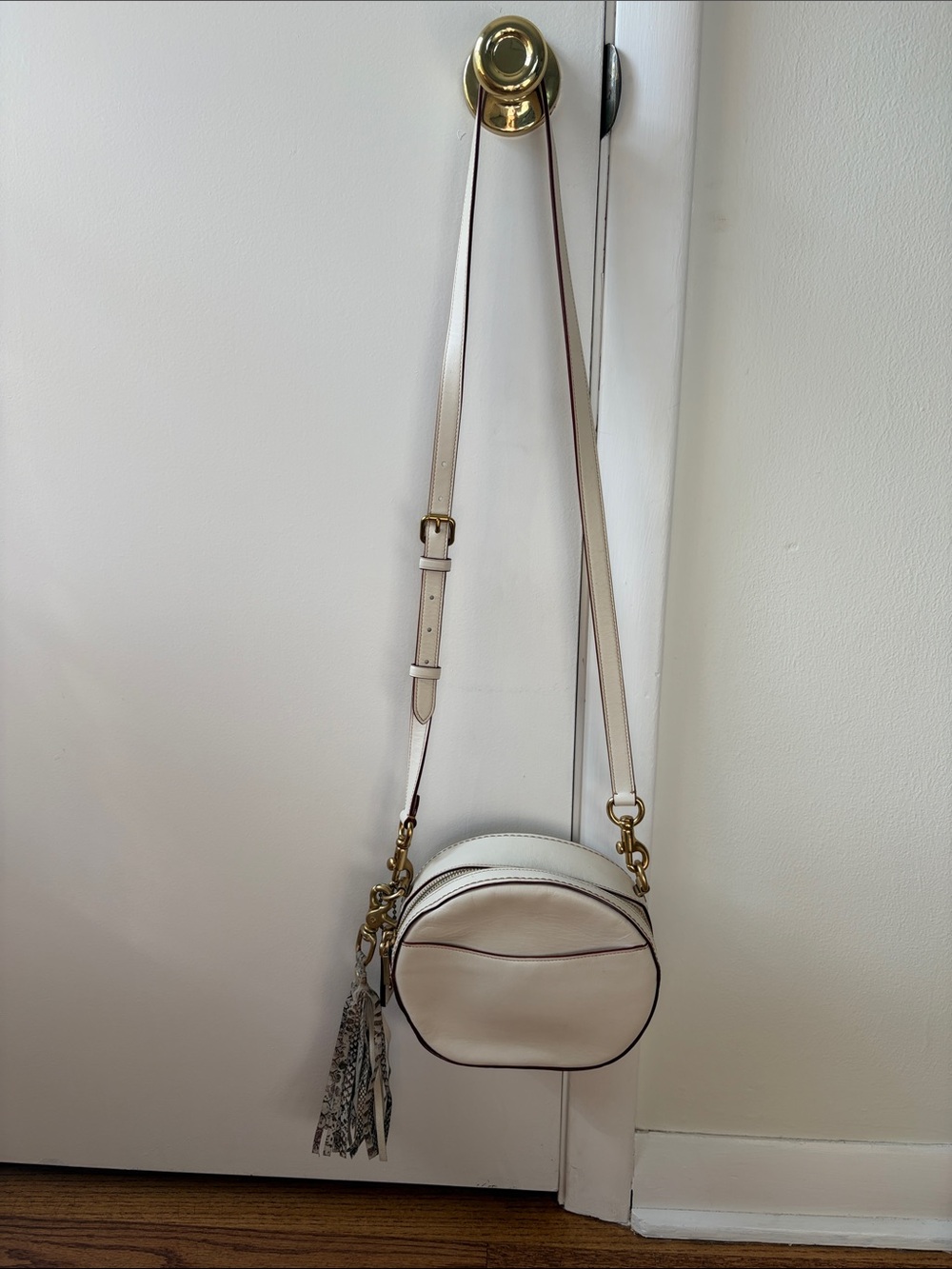 COACH Cream Round Crossbody Bag with Tassel - Picture 2 of 4